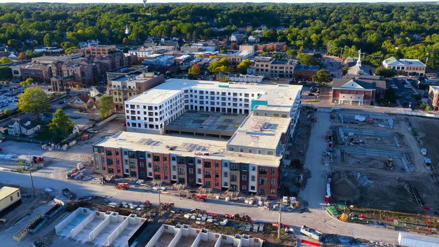 Aerial view of a new residential building under construction in a developing urban area in Michigan.