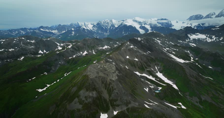 Aerial view of the rugged, snow-capped peaks of Mount McKinley in Denali Borough, Alaska, United States.