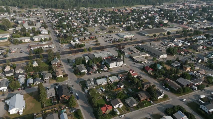 Residential Homes Line Streets In Fernie, British Columbia, Canada, With A Developed Neighborhood. Aerial Rotate Shot