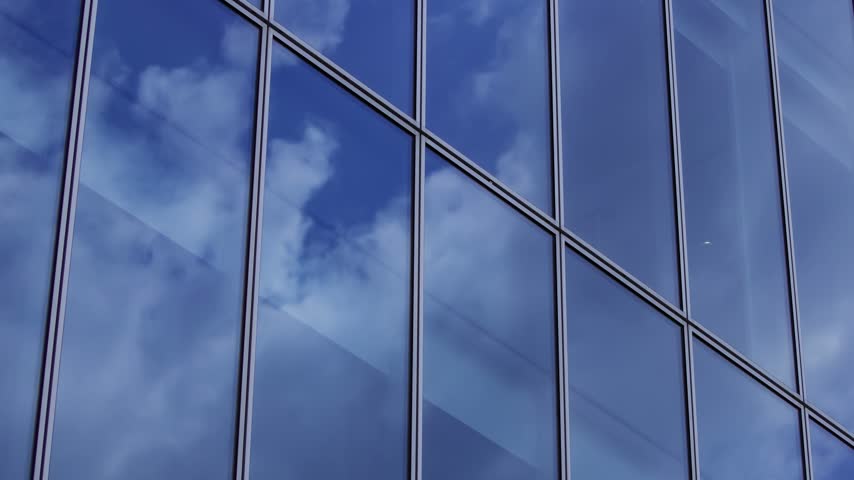 A timelapse of cloud reflecting the office building in Aoyama Tokyo. High quality 4k footage. Minato district Aoyama Tokyo Japan 08.19.2026 Here is a business town in Tokyo. It is center of the city