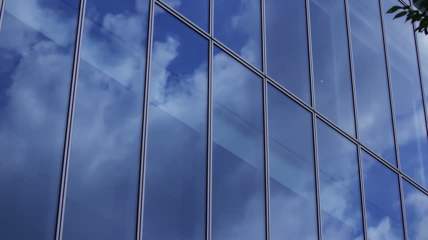 A timelapse of cloud reflecting the office building in Aoyama Tokyo. High quality 4k footage. Minato district Aoyama Tokyo Japan 08.19.2026 Here is a business town in Tokyo. It is center of the city