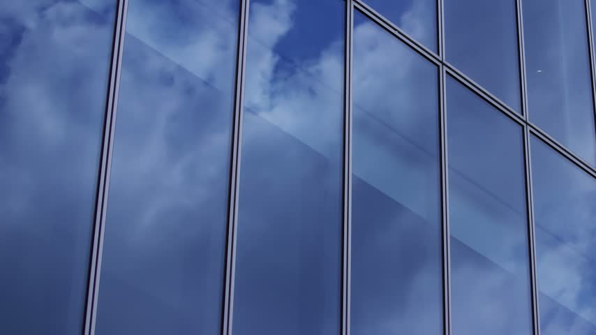 A timelapse of cloud reflecting the office building in Aoyama Tokyo. High quality 4k footage. Minato district Aoyama Tokyo Japan 08.19.2026 Here is a business town in Tokyo. It is center of the city