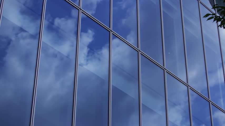 A timelapse of cloud reflecting the office building in Aoyama Tokyo. High quality 4k footage. Minato district Aoyama Tokyo Japan 08.19.2026 Here is a business town in Tokyo. It is center of the city