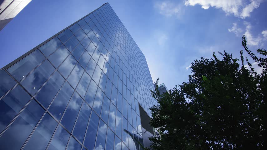 A timelapse of cloud reflecting the office building in Aoyama Tokyo. High quality 4k footage. Minato district Aoyama Tokyo Japan 08.19.2026 Here is a business town in Tokyo. It is center of the city