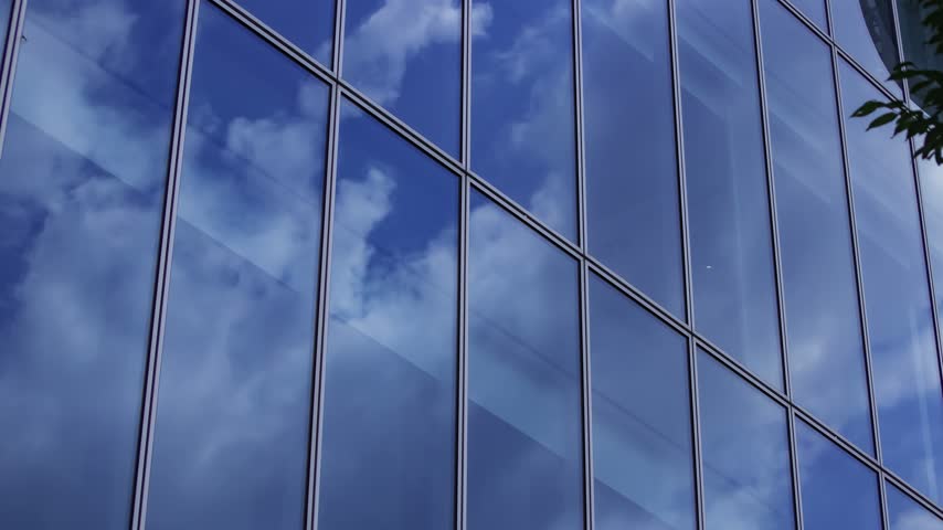 A timelapse of cloud reflecting the office building in Aoyama Tokyo. High quality 4k footage. Minato district Aoyama Tokyo Japan 08.19.2026 Here is a business town in Tokyo. It is center of the city