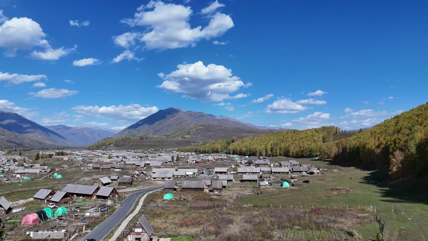 A view of Hemu Ancient Village during the autumn foliage season in Northern Xinjiang, China.