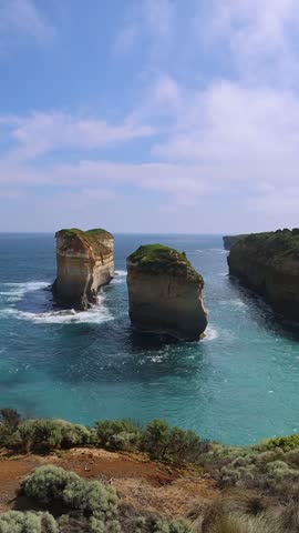 Panoramic view of Tom and Eva limestone rock stacks off Loch Ard Gorge on the Great Ocean Road coast Victoria Australia, Twelve Apostles National Park