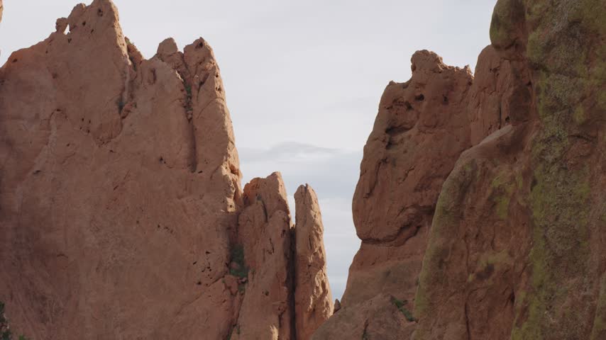 Static telephoto shot of dramatic rock formations inside the Garden of the Gods Park Colorado Springs