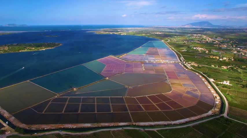 Aerial view of the colorful salt pans in Sicily, Italy.