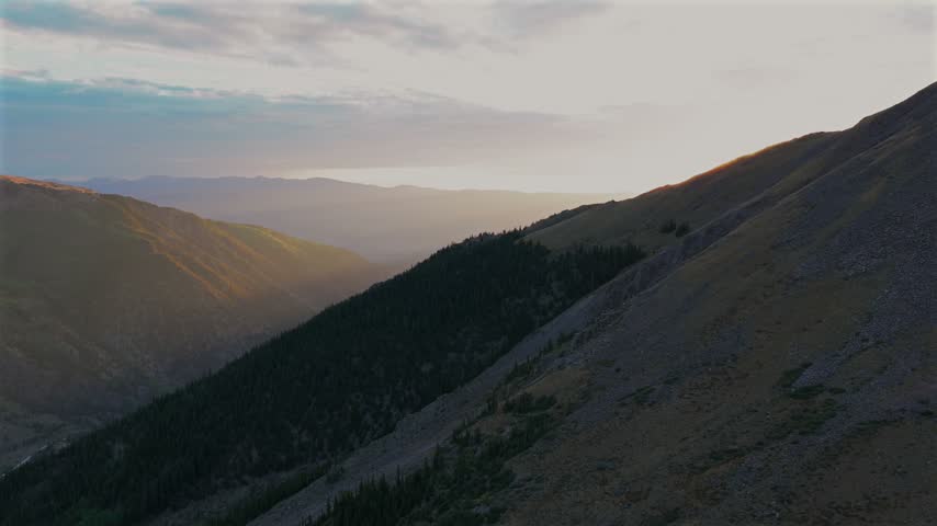 Missouri Gulch Trail summer sunrise morning sun rays Mount Elbert 14ers Leadville Buena Vista Colorado aerial drone Rocky Mountains Collegiate Peaks Wilderness Sawatch Range nature landscape upwards