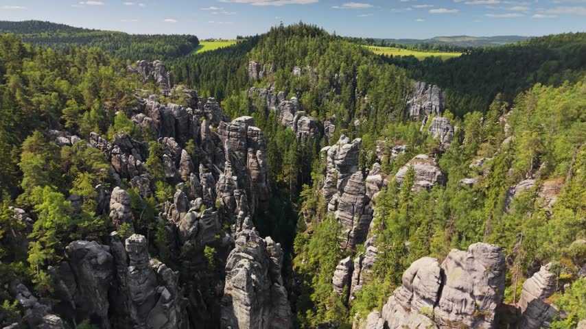Aerial view of the famous Adrspach Teplice rocks in Czech Republic. Breathtaking natural wonder of Adrspach Teplice rocks captured from above. High cliffs tower over the pristine woodland