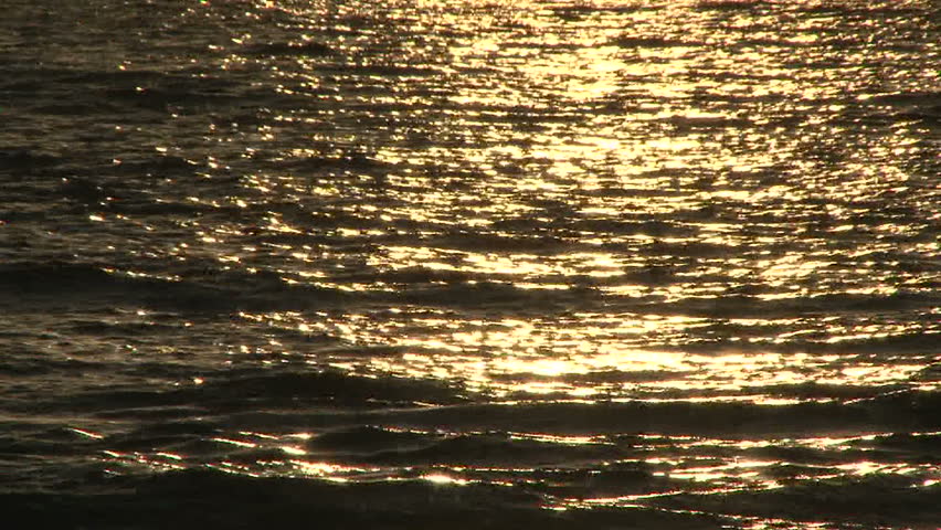 Calm water and sun reflection background.