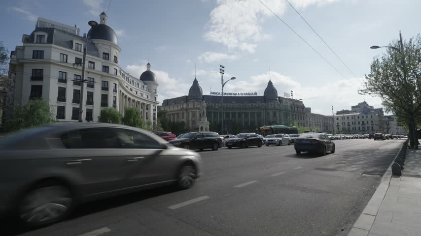 Traffic along a busy road in Bucharest, Romania 