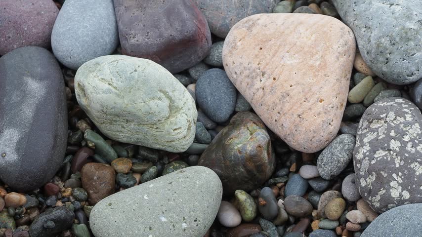 multicolored pebbles on the seashore