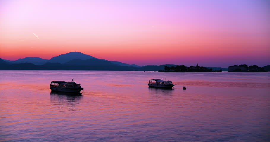 Multicolored landscape at dawn on the lake