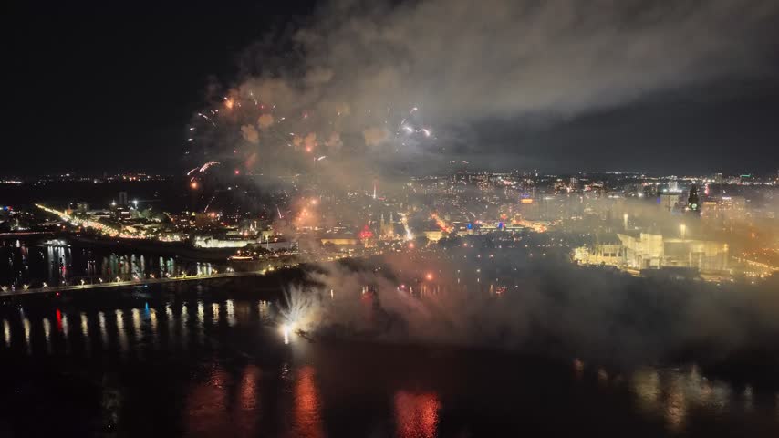 Ottawa, Canada, fireworks over Parliament Hill and the Ottawa River amid heavy smoke, haze and air pollution. g.