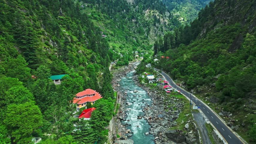 Lush Green Mountain Valley Surrounded by Dramatic Peaks, Aerial View of Kaghan Valley, Pakistan
