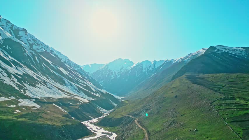 Lush Green Mountain Valley Surrounded by Dramatic Peaks, Aerial View of Naran Kaghan Valley, Pakistan