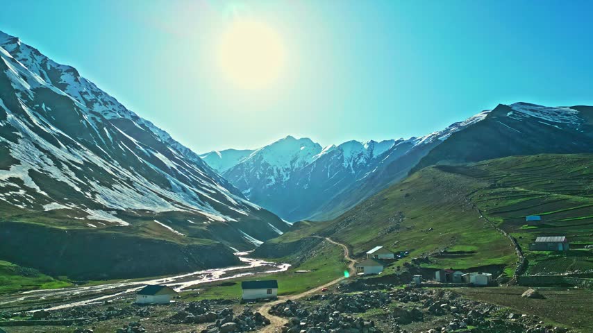 Lush Green Mountain Valley Surrounded by Dramatic Peaks, Aerial View of Naran Kaghan Valley, Pakistan