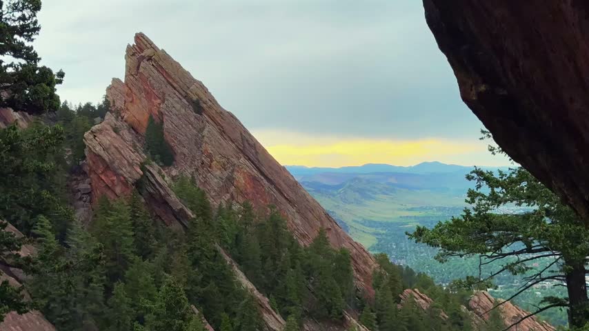 The Flatirons Royal Arch Trail Boulder Colorado Front Range Rocky Mountains foothills nature landscape Chautauqua Park spring summer afternoon overcast clouds hiking trail tall red rocks landmark