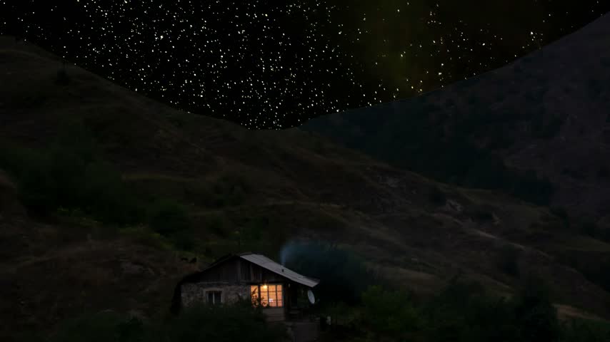 Milky Way and starry night. Lonely house with warm window light in the mountains under a starry night sky and Milky Way Galaxy timelapse. Village atmosphere