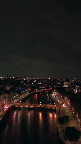 50FPS vertical aerial video of the River Liffey in Temple Bar, Dublin, Ireland at night. Produced in 1080x1920 and with Rec709 colour.