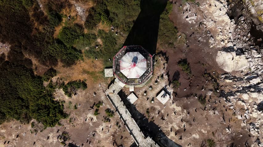 Experience breathtaking aerial views of the historic Digby lighthouses in Nova Scotia, set amidst the stunning coastal landscape and rugged terrain.