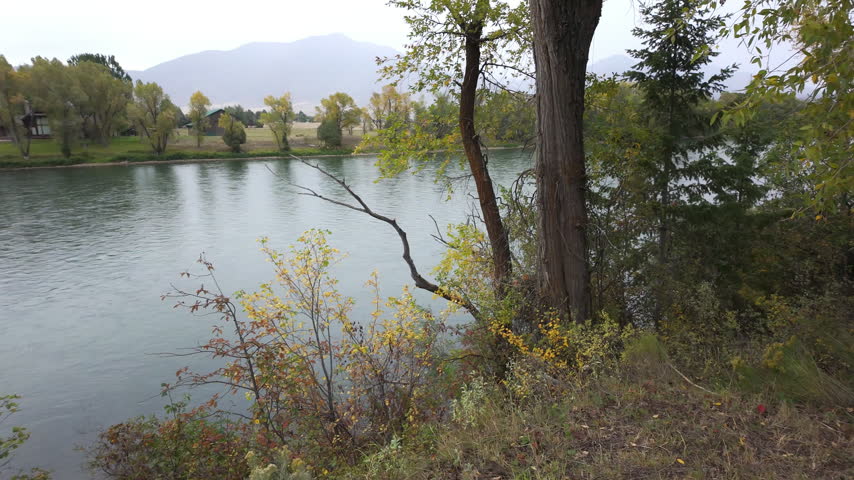 Panning view of the Snake River in Eastern Idaho during the Fall.