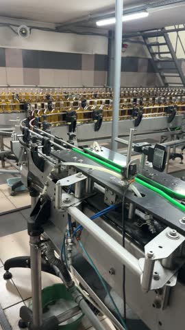 Exploring the bottling process at a local distillery located in a manufacturing facility