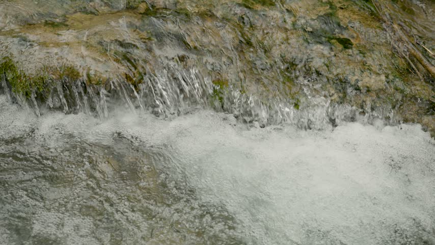 River cascade closeup in slow motion.