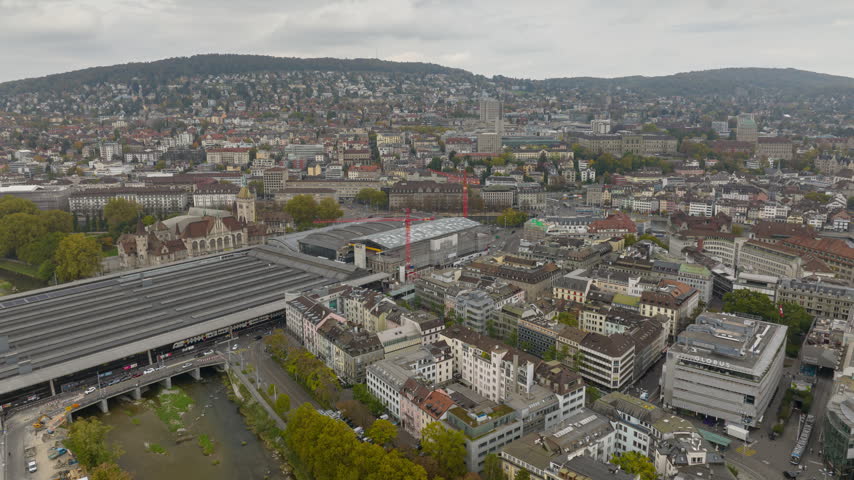 day time zurich city center traffic train station district panorama 4k timelapse switzerland