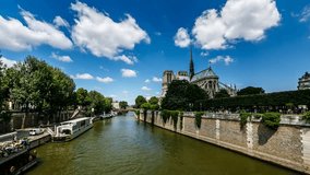 PARIS, FRANCE - JUNE 30: Notre Dame Cathedral and Seine River Timelapse Video on June 30, 2013 in Paris, France. Notre-Dame is one of the most famous landmarks of the French capital.