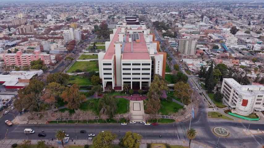 Aerial Dolly Out Over Centro Civico de San Juan Argentina with Traffic Avenue and Urban Cityscape
