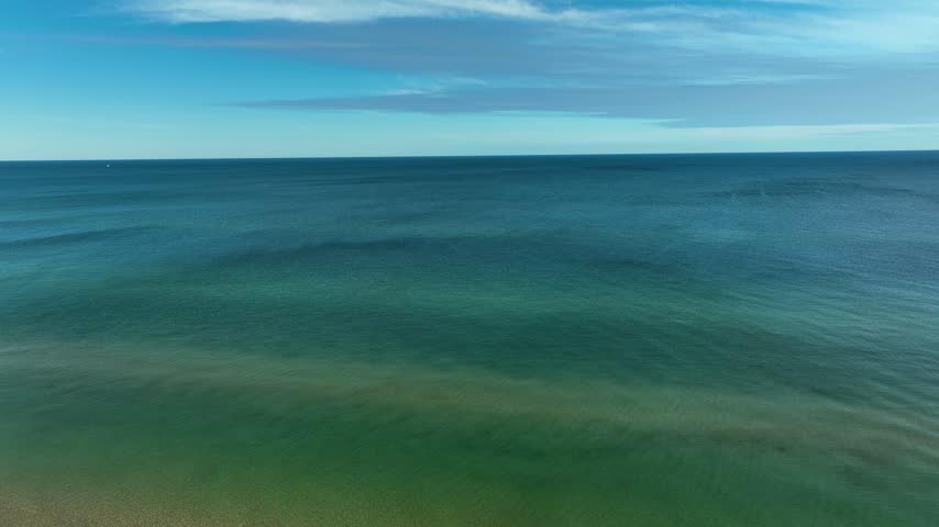 From the lakeshore to the construction site during the build.