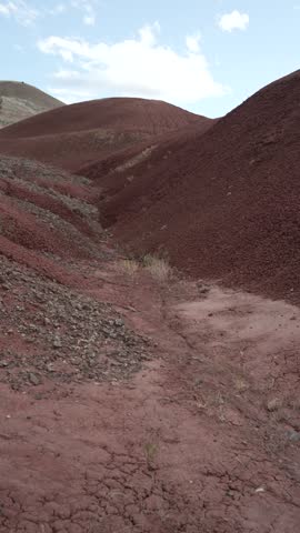 Vertical view of red clay mounds at the Painted Hills in Oregon