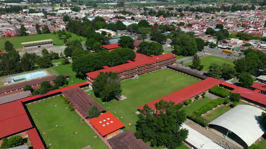 Drone orbit around Centro Regional de Educacion Santa Rosa elementary school campus in Ciudad Guzman, Jalisco