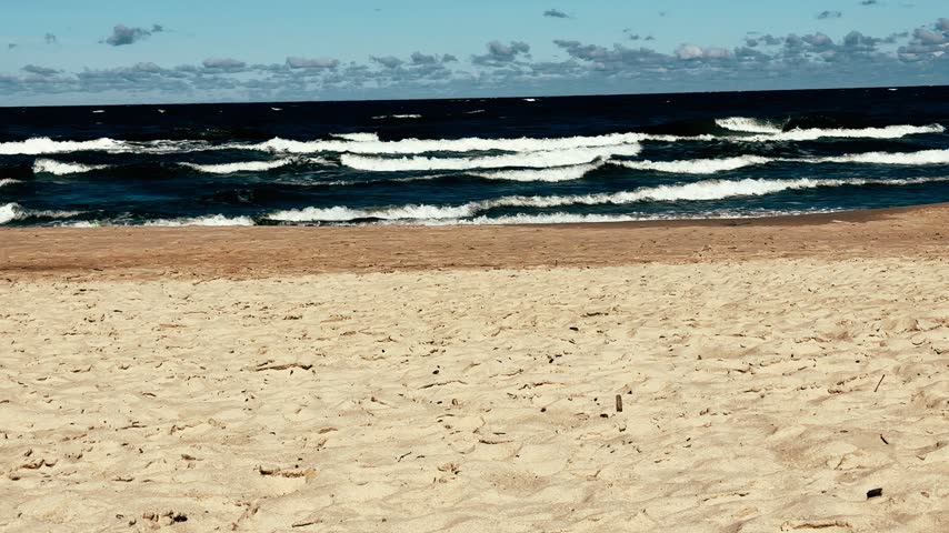 Poland, Stegna - 06-05-2026: People resting on a beach of Baltic Sea.