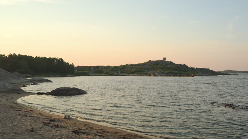 Sunset over beach in summer.