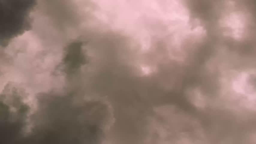 Animated Storm Clouds Shifting Across a Dusky Sky, Creating a Dramatic