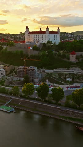 Aerial view of Bratislava Castle at sunset, a historic landmark in the capital city of Bratislava, Slovakia