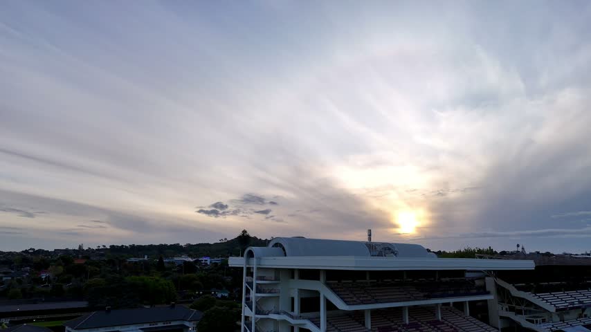 Aerial view of the Ellerslie Event Centre at sunset with dramatic clouds over the building structure in Ellerslie, Auckland, New Zealand.