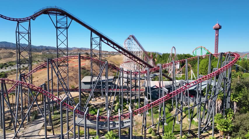 Aerial amusement park red roller coaster ride, theme park, thrill ride