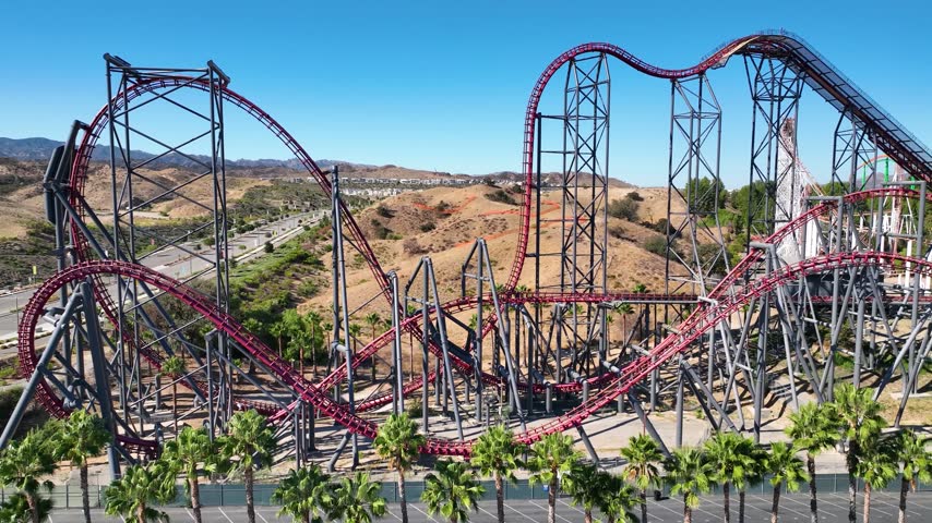 Aerial amusement park red roller coaster ride, theme park, thrill ride