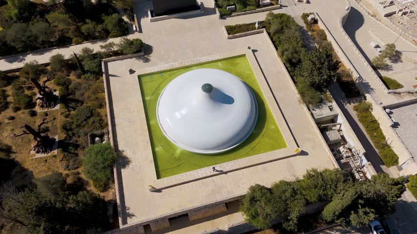Aerial view of the Shrine of the Book at the Israel Museum surrounded by a reflecting pool and stone walkways in Jerusalem, Jerusalem District, Israel.
