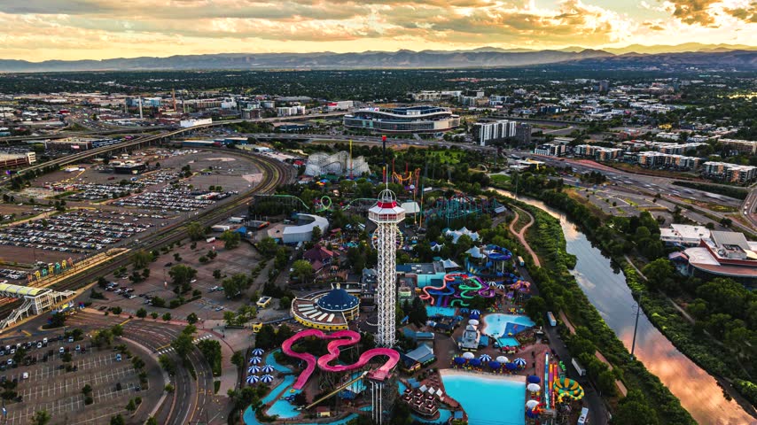 Aerial view of Elitch Gardens Theme and Water Park with roller coasters, water slides, and the observation tower in Denver, Colorado, United States.