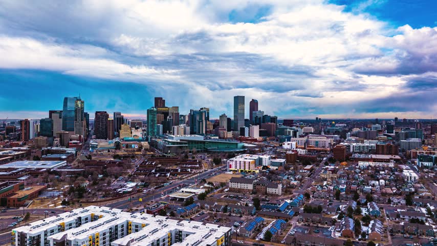 Aerial view of the Denver skyline featuring modern skyscrapers and urban architecture in Denver, Colorado, United States.