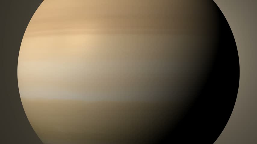 A cinematic close-up view of the planet Saturn rotating slowly in the darkness of outer space.