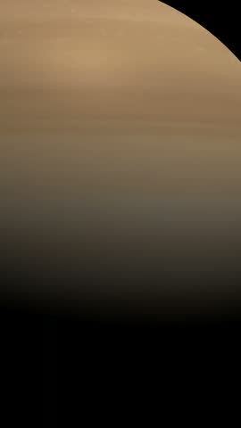 A detailed close up view of the planet Saturn showing atmospheric bands and dark space background.