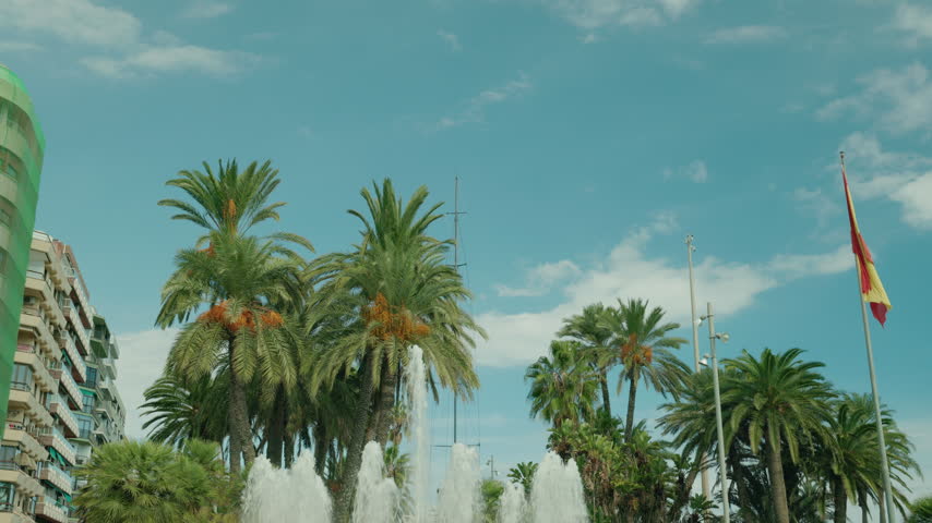 A fountain sprays along Alicante