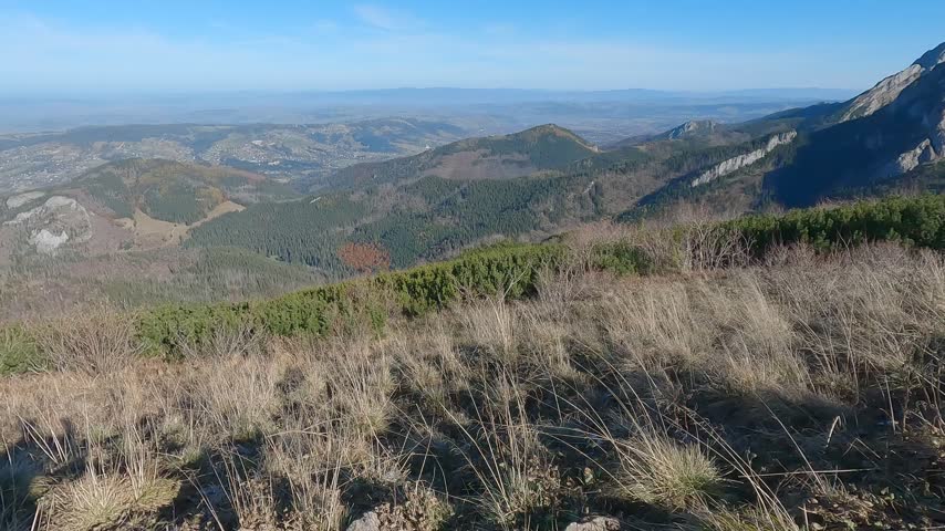 Wide view across valleys and foothills from the Czerwone Wierchy mountain route